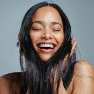 Photo of a happy woman with great hair